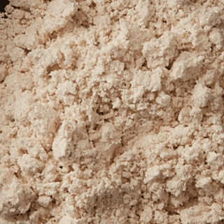 Close-up of colloidal oats powder.