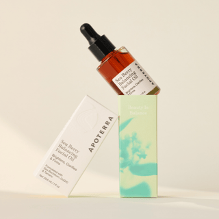 Apoterra Sea Berry Balancing Facial Oil balanced on its box