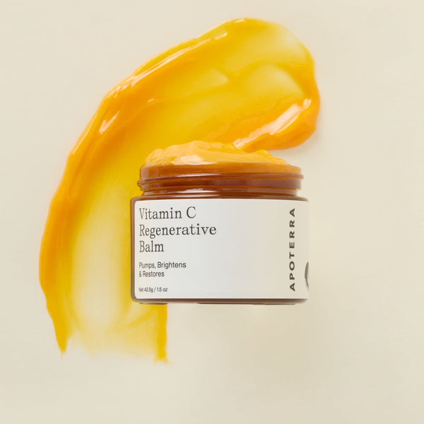 Apoterra Vitamin C Balm jar and texture swipe showing rich, golden texture