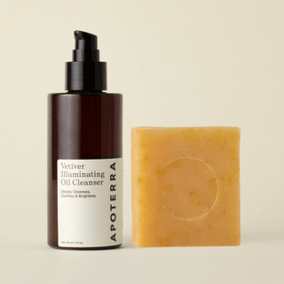 Apoterra Vetiver Illuminating Oil Cleanser bottle and Pumpkin & Wild Carrot Cleanser soap bar hero image
