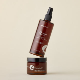 Rose Essential Hydration Mist and Vitamin C Regenerative Balm stacked on top on one another