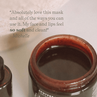 Hibiscus Exfoliating Mud lifestyle texture photo with customer review of face and lips feeling soft and clean.