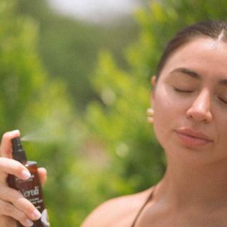 Model spraying Apoterra's Neroli Clarifying Complexion Face Mist for improved hydration 