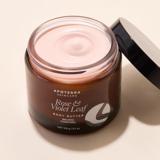 Rose & Violet Leaf Body Butter by Apoterra main product image with jar open showing smooth, whipped texture of the body butter with cupuacu & shea butters for moisture replenishment