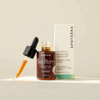Sea Berry Balancing Facial Oil by Apoterra main product image with box for brightening, clearing, and firming skin
