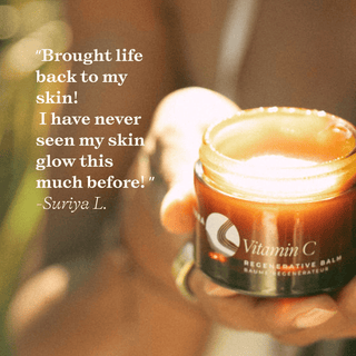 Lifestyle image model holding Vitamin C Balm with glowing customer review