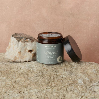 Mineral Purifying Mask with activated charcoal by Apoterra in easy to carry travel-sized jar